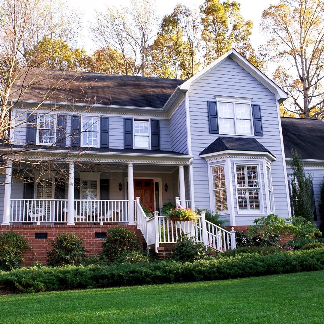 House with lawn and stair