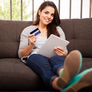 Image of a woman and a credit card