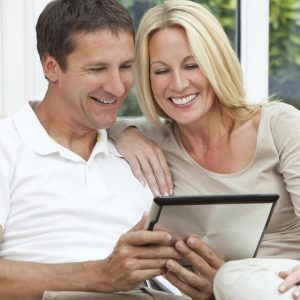 image of a couple looking over finances