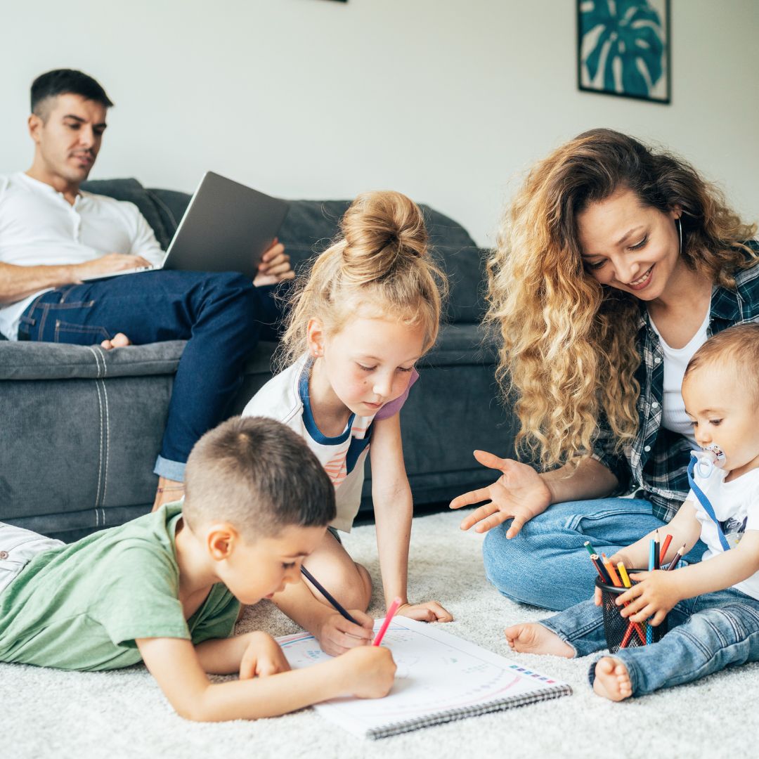 busy family and dad on laptop